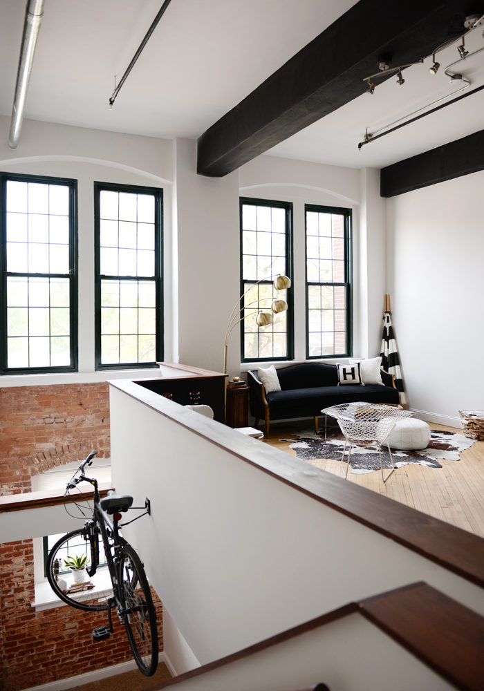 two-story loft with exposed brick